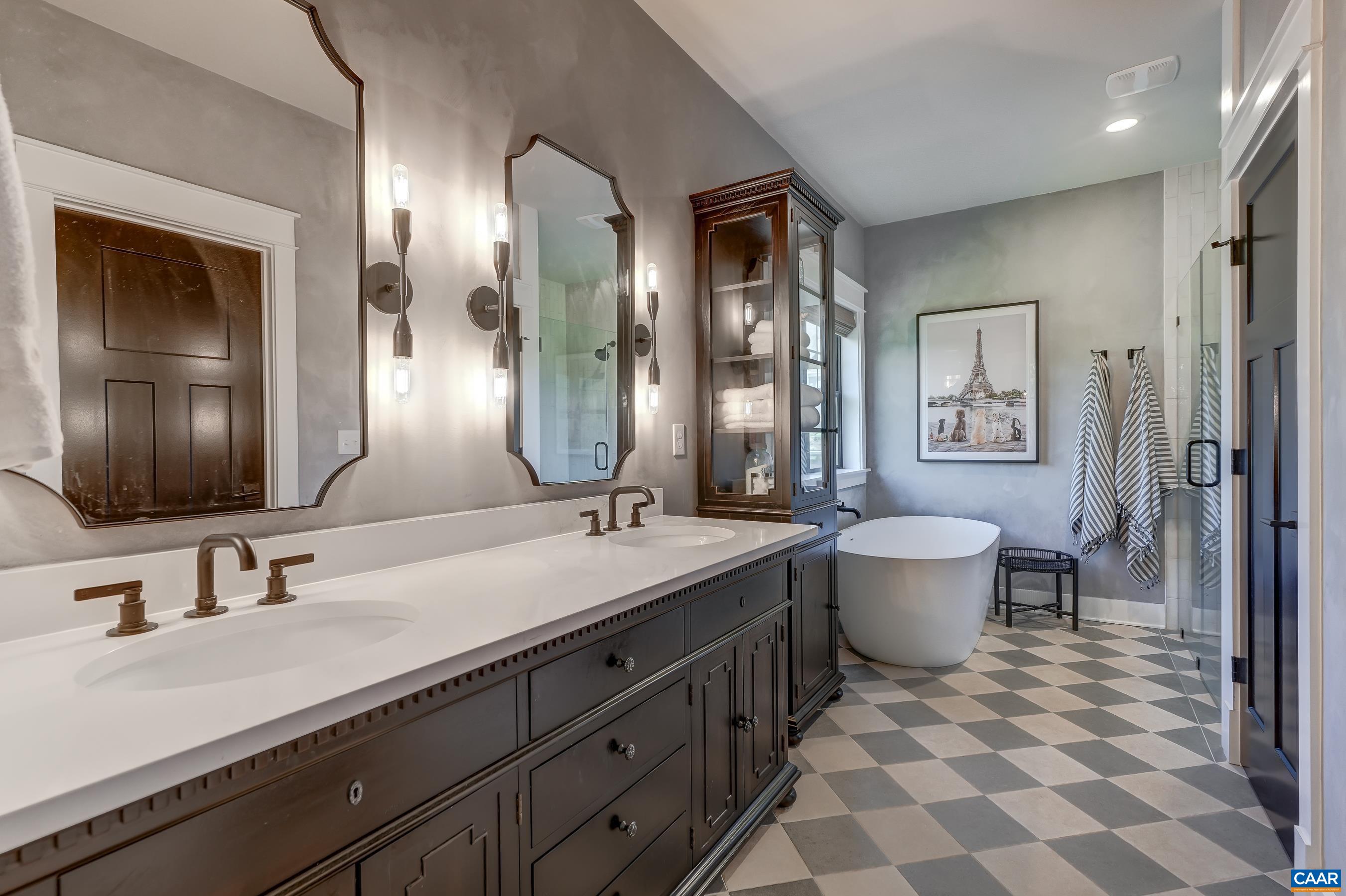 3327 Rowcross Street Crozet, VA 22932 - Photo 28 of 63 Spa-like ensuite primary bathroom features dual sink quartz vanity.