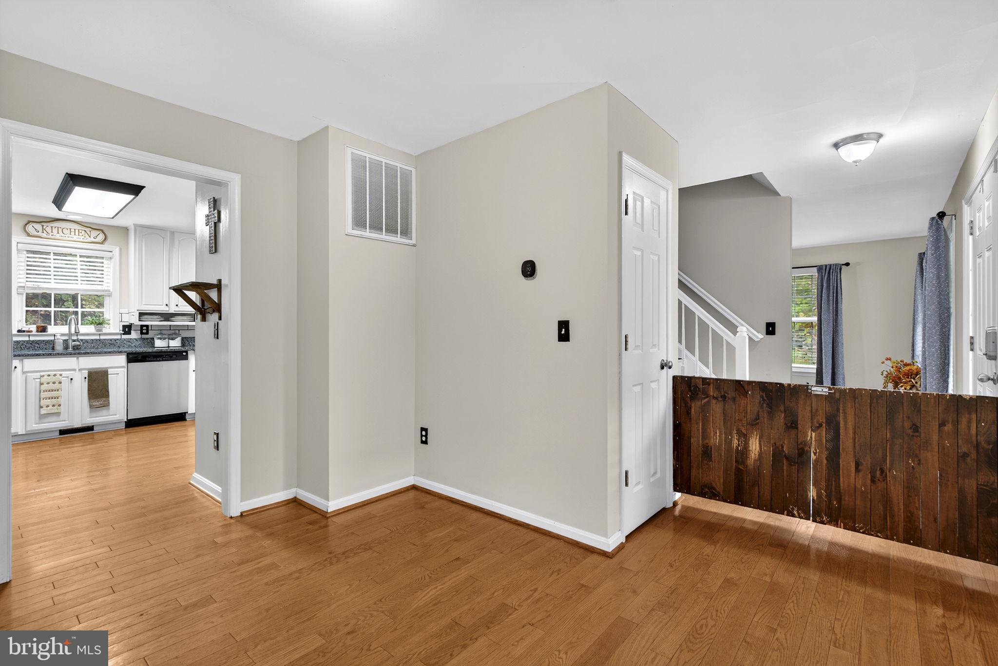 10277 River Road Rixeyville, VA 22737 - Photo 16 of 32 a view of a kitchen with a sink and a refrigerator