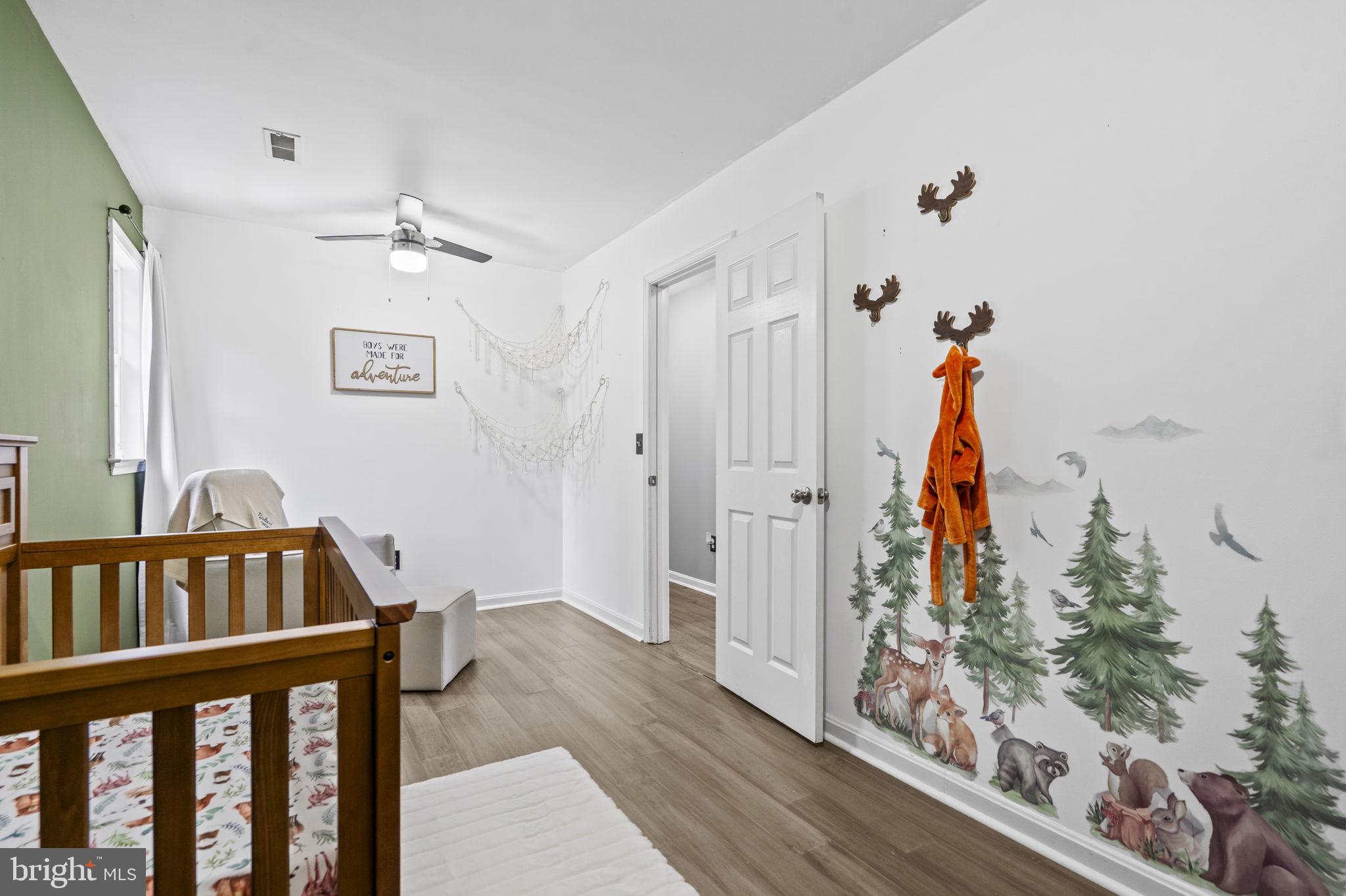 10277 River Road Rixeyville, VA 22737 - Photo 24 of 32 a view of a hallway with wooden floor and stairs