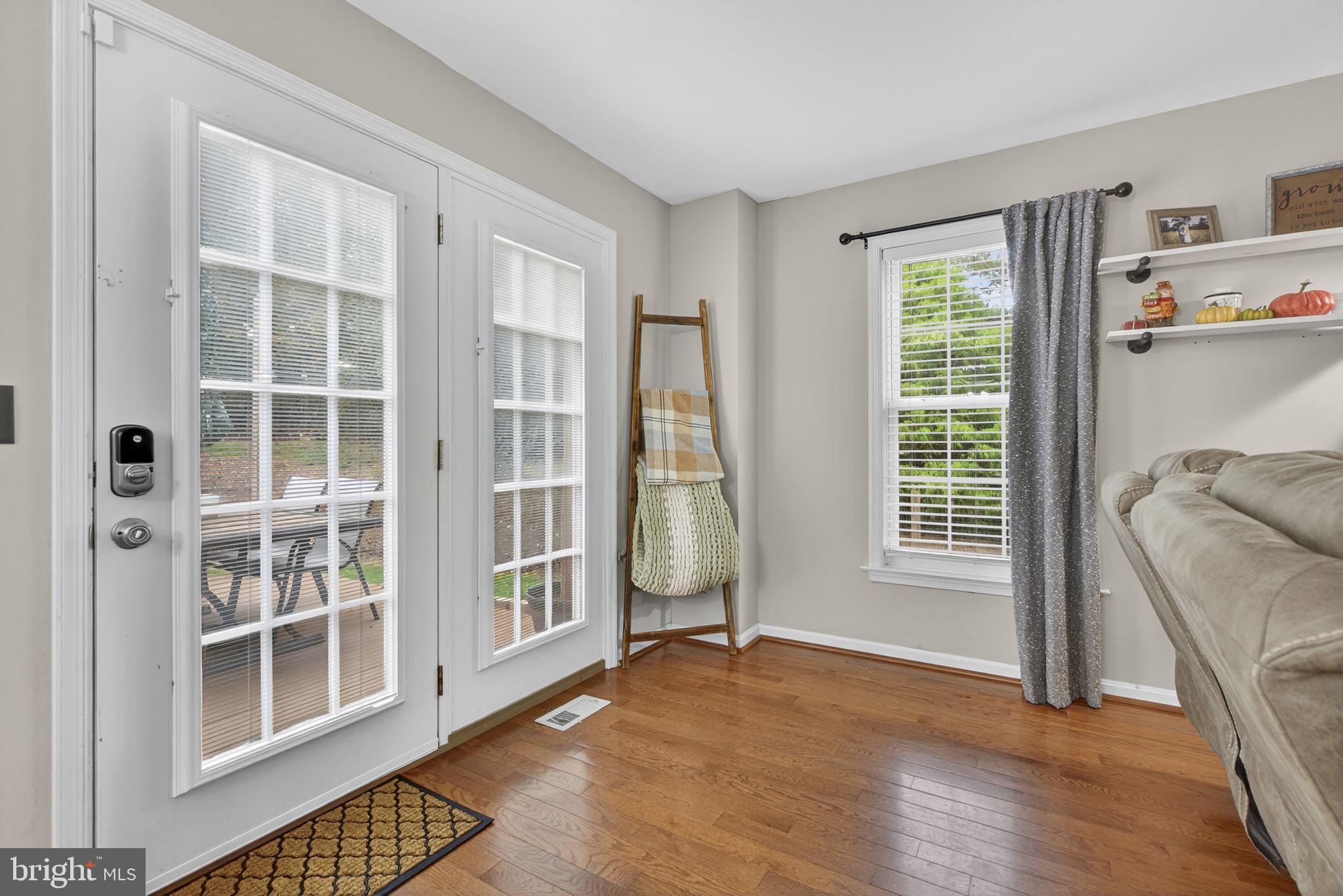 10277 River Road Rixeyville, VA 22737 - Photo 8 of 32 a view of an empty room with a window and wooden floor