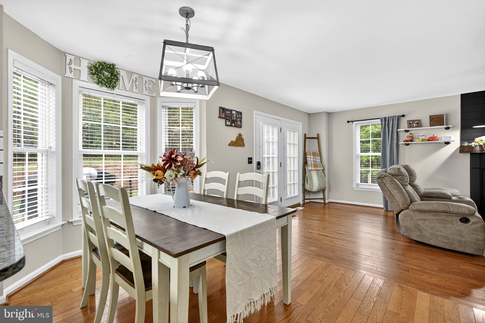 10277 River Road Rixeyville, VA 22737 - Photo 9 of 32 a dining room with furniture and wooden floor