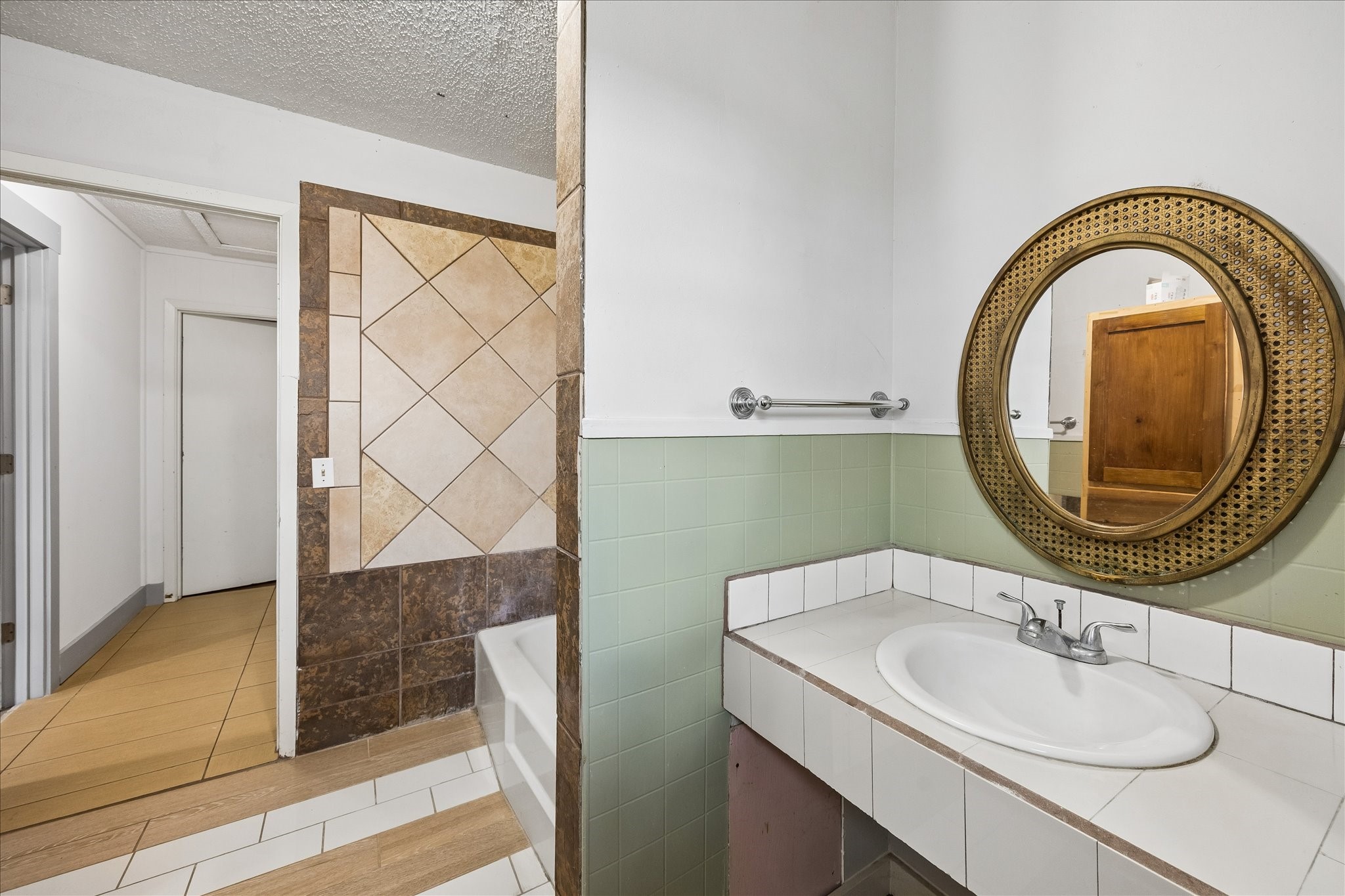 4435 Hartfield Road Round Top, TX 78954 - Photo 19 of 20 a bathroom with a sink and a mirror