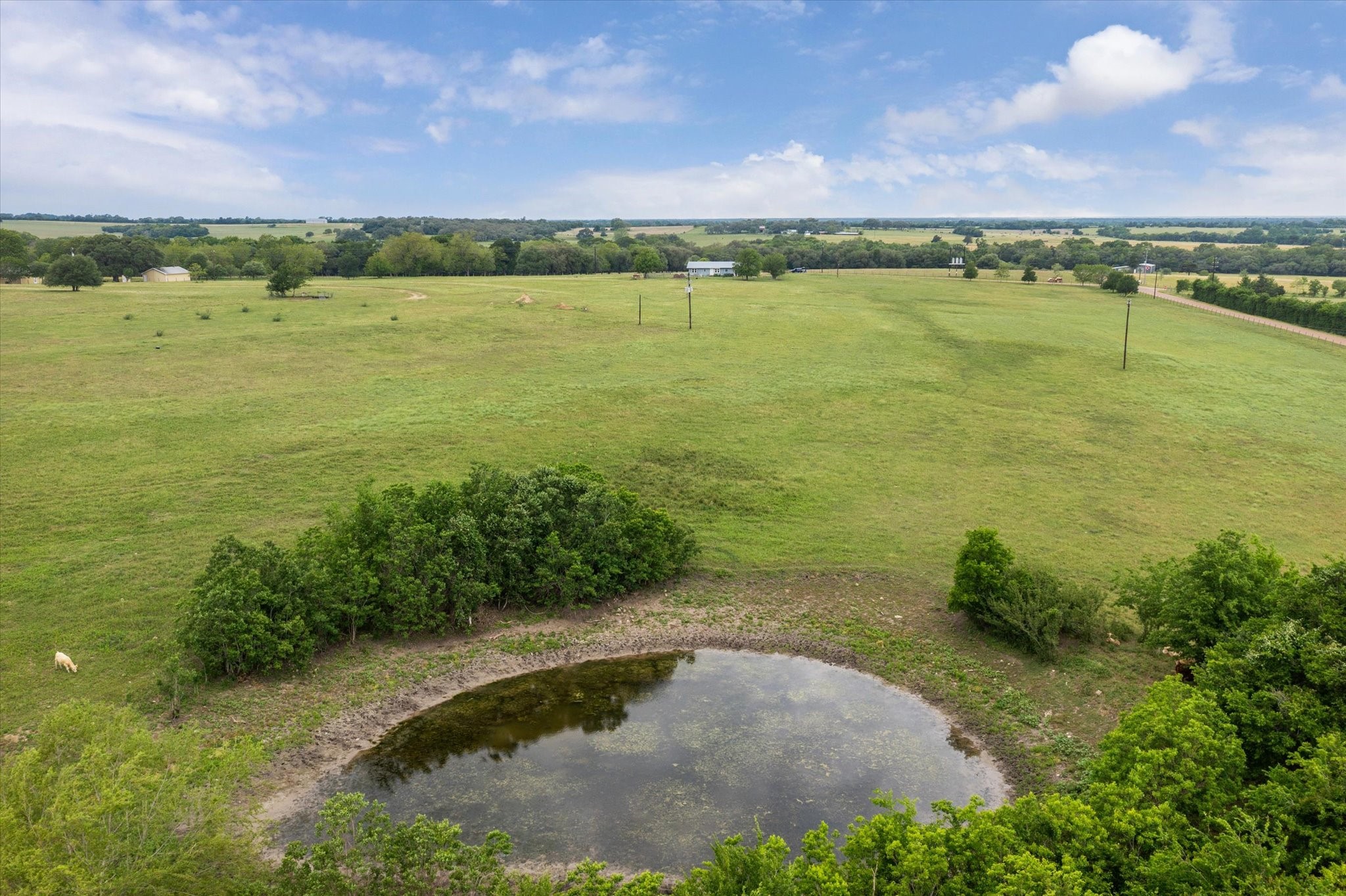 4435 Hartfield Road Round Top, TX 78954 - Photo 2 of 20 a view of an ocean and mountain