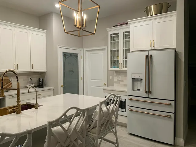 a view of swimming pool with outdoor seating and yard in the back