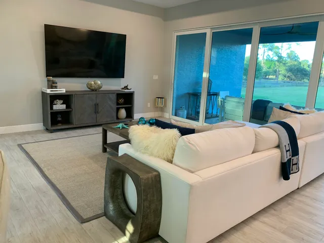 a view of a golf course with a lake