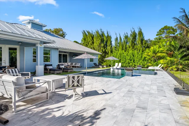 a view of a swimming pool and lake view
