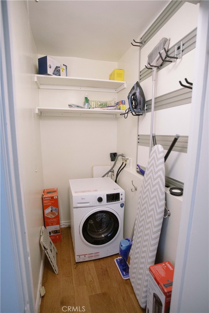 315 West 3rd Street, Unit 305 Long Beach, CA 90802 - Photo 10 of 19 a utility room with dryer and washer