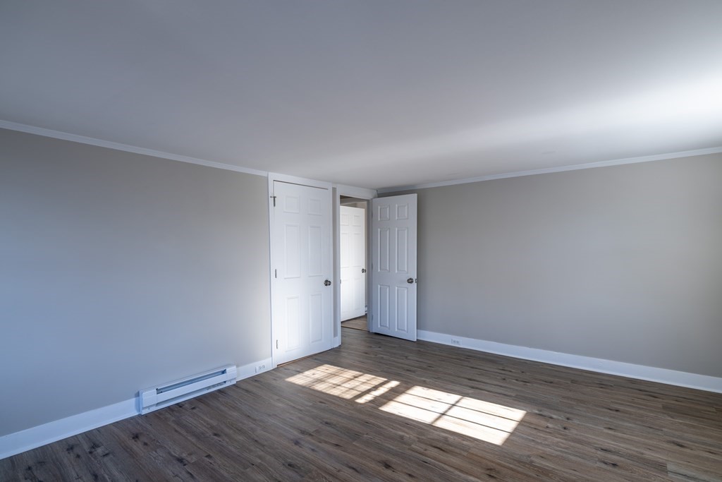 268 Locust Street Fall River, MA 02720 - Photo 35 of 38 a view of an empty room and wooden floor