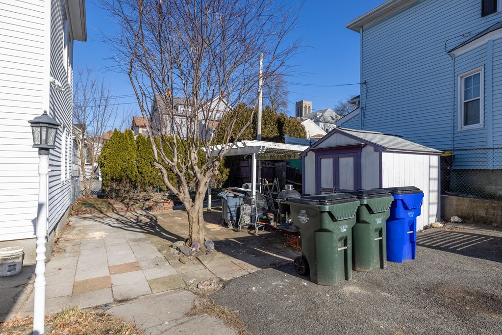 268 Locust Street Fall River, MA 02720 - Photo 7 of 38 a view of a chairs and tables in patio