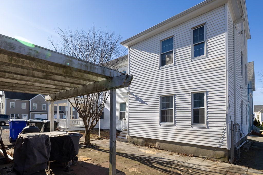 268 Locust Street Fall River, MA 02720 - Photo 8 of 38 a view of a house with backyard and porch