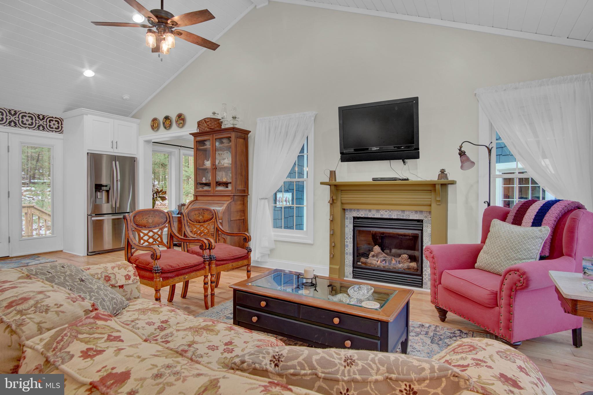 401 Orchard Road Orrtanna, PA 17353 - Photo 18 of 54 living room view, electric fireplace, ceiling fan