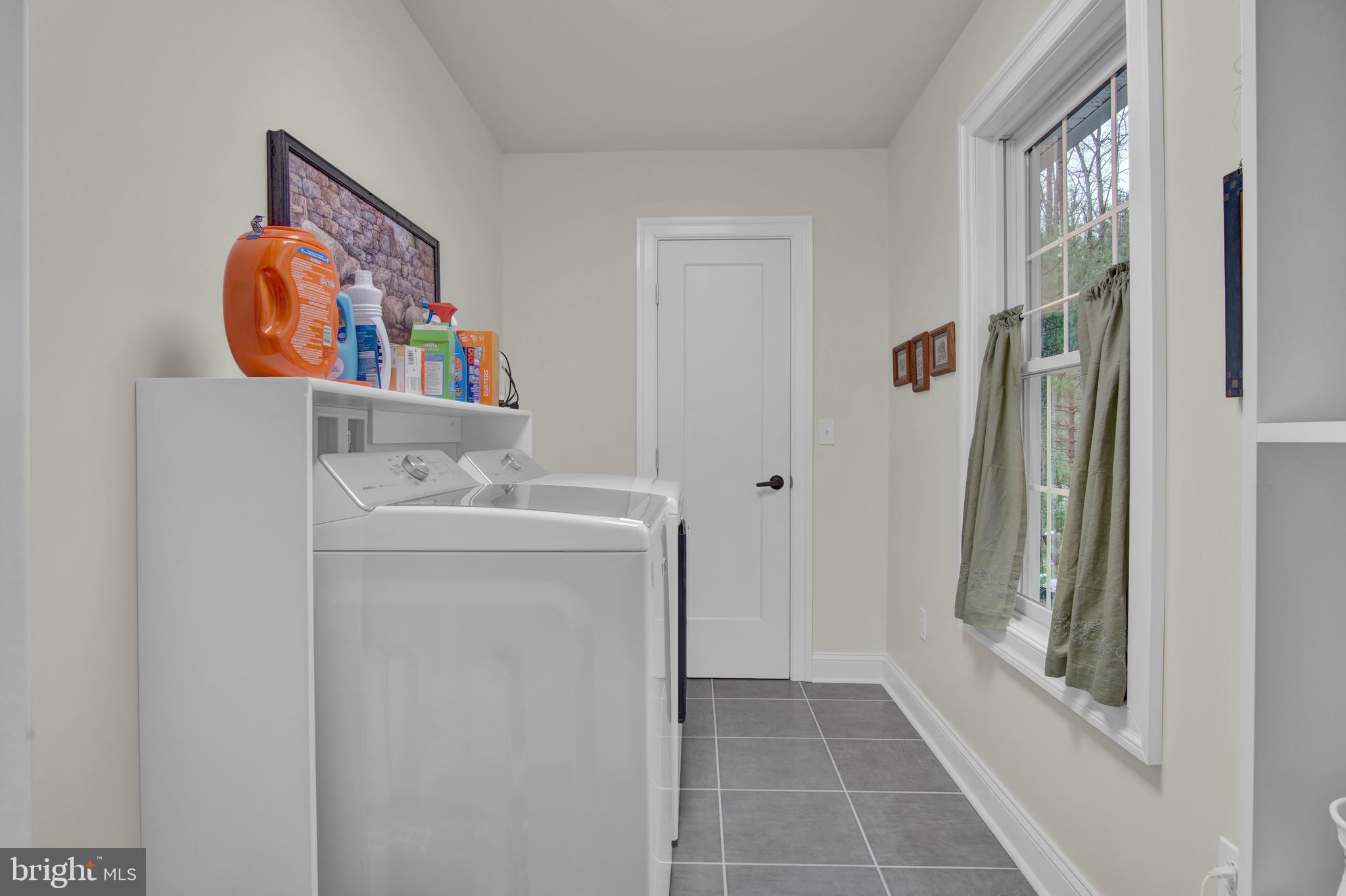 401 Orchard Road Orrtanna, PA 17353 - Photo 30 of 54 level 1 laundry, view of pantry door