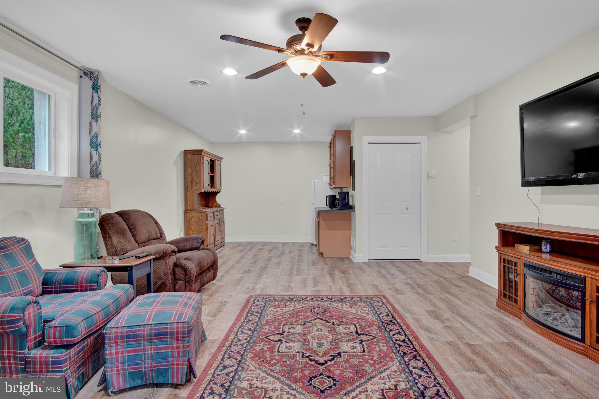 401 Orchard Road Orrtanna, PA 17353 - Photo 32 of 54 basement lower level, vinyl flooring, ceiling fan
