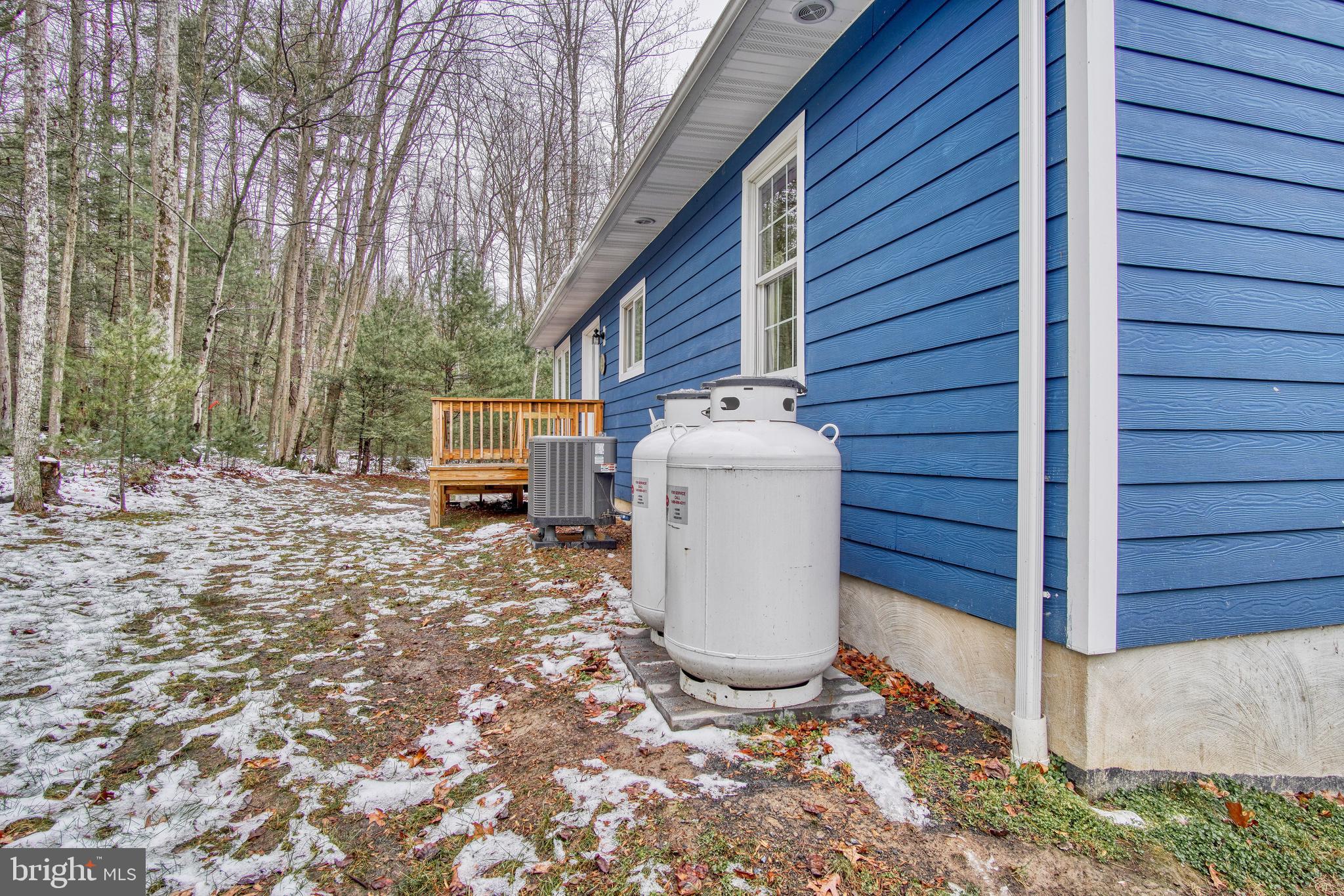 401 Orchard Road Orrtanna, PA 17353 - Photo 45 of 54 View of back of house and propane tanks