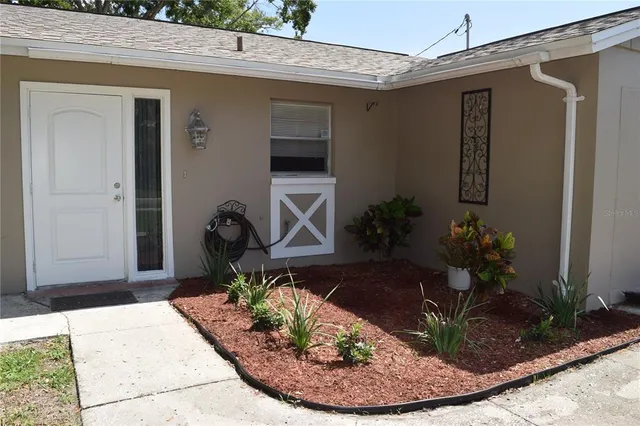 a view of a entryway front of a house