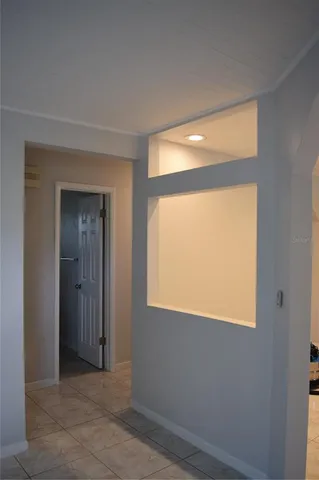 a front view of a house with a yard garage and outdoor seating