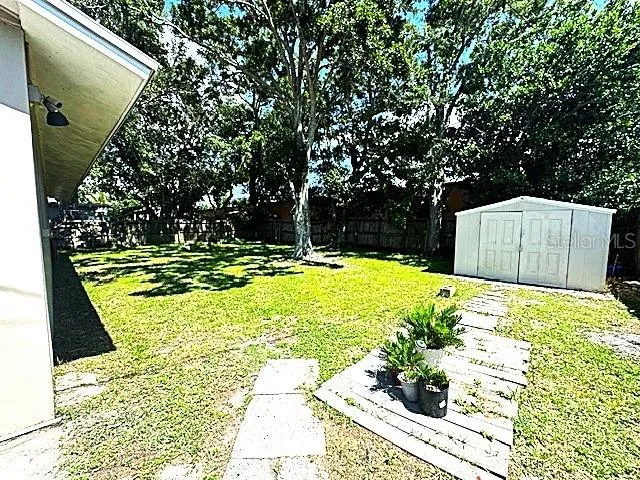 a view of swimming pool with a garden