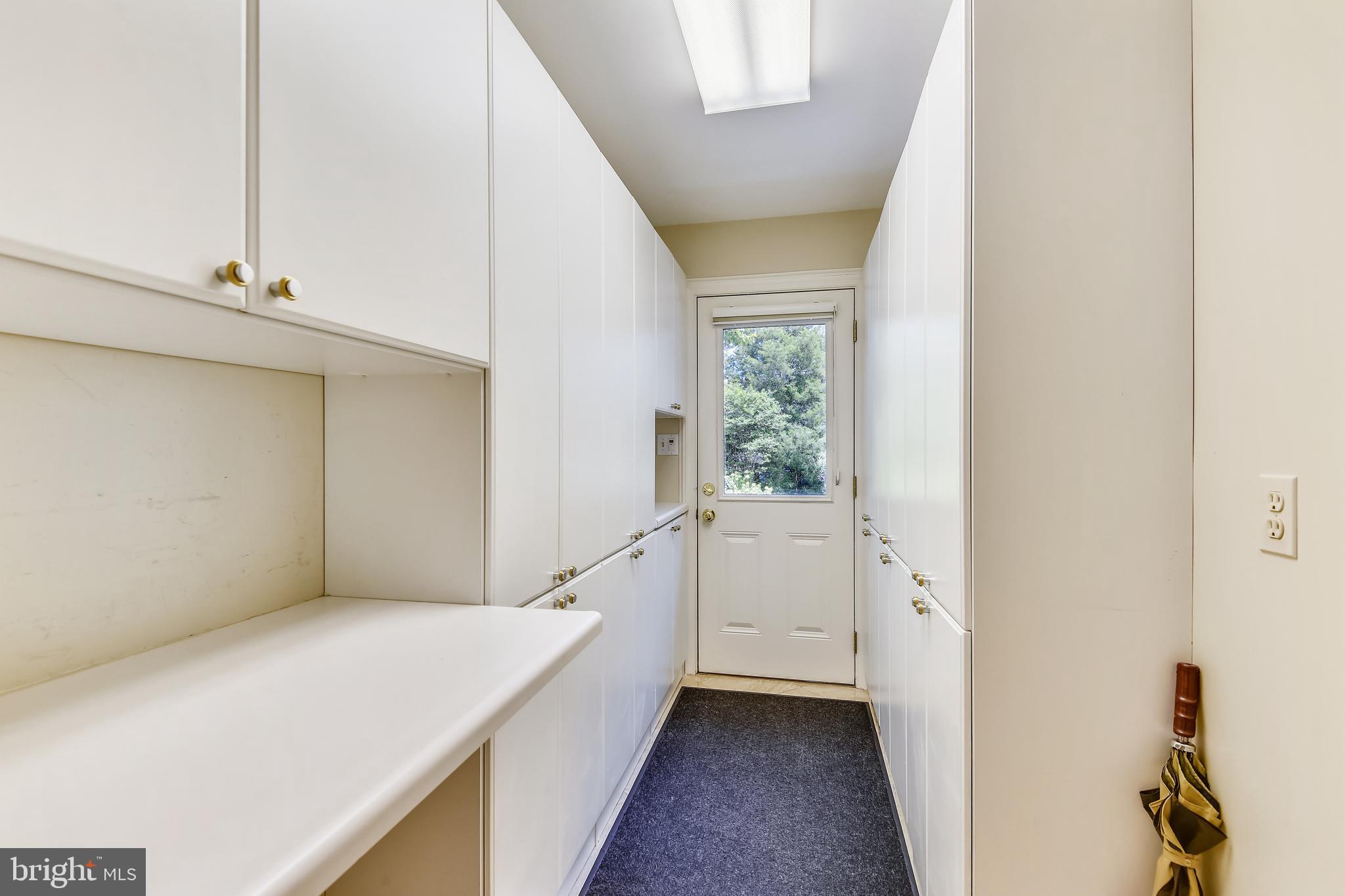 11911 Seven Locks Road Potomac, MD 20854 - Photo 12 of 57 Butlers pantry with door to the backyard
