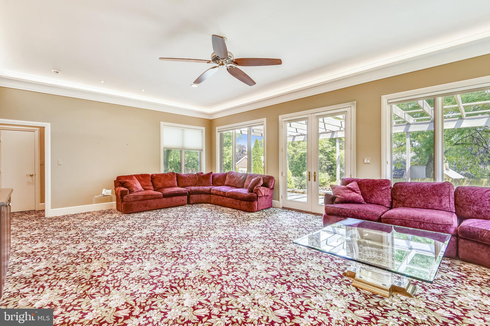 11911 Seven Locks Road Potomac, MD 20854 - Photo 15 of 57 Living room with view of the backyard