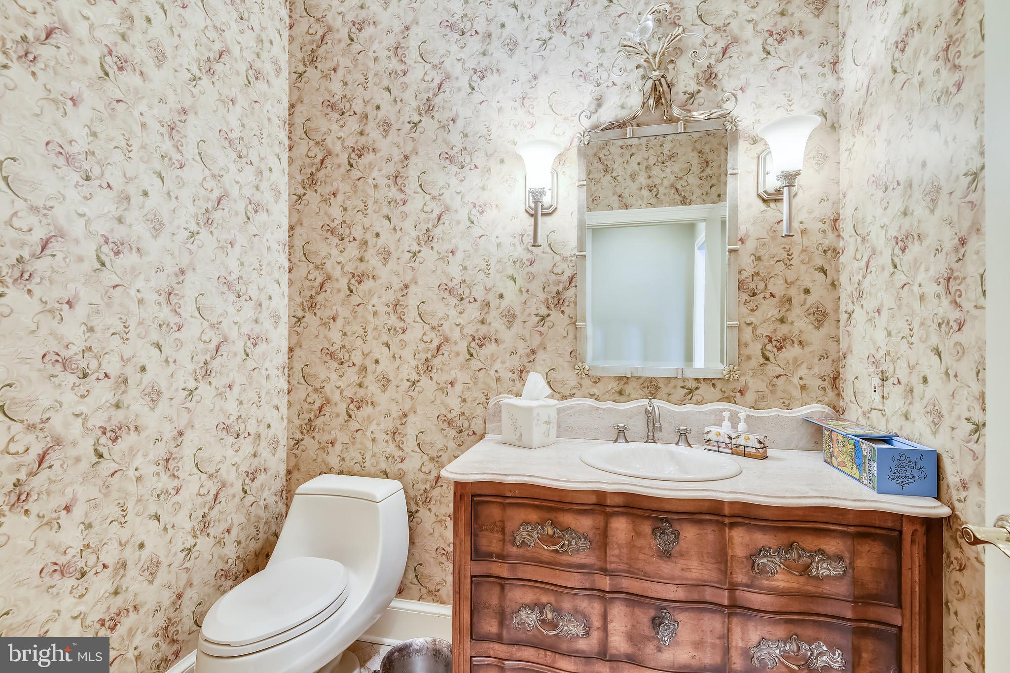 11911 Seven Locks Road Potomac, MD 20854 - Photo 16 of 57 Powder room 2 off the living room