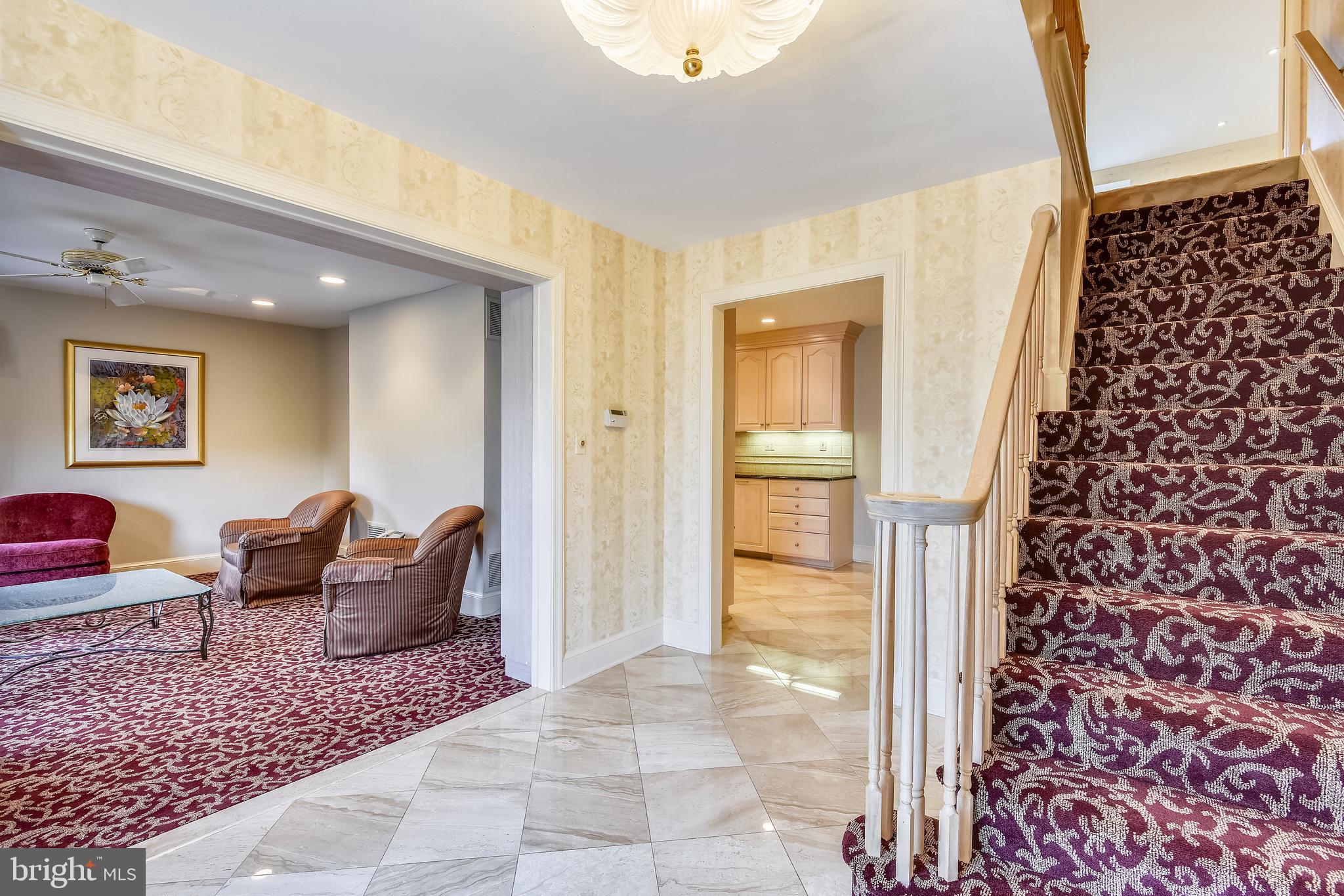 11911 Seven Locks Road Potomac, MD 20854 - Photo 4 of 57 Large foyer with view of the library and kitchen