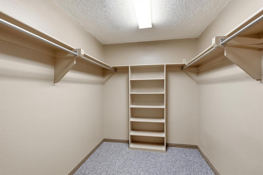 135 Private Road 2202 Decatur, TX 76234 - Photo 18 of 40 Walk in closet with light colored carpet