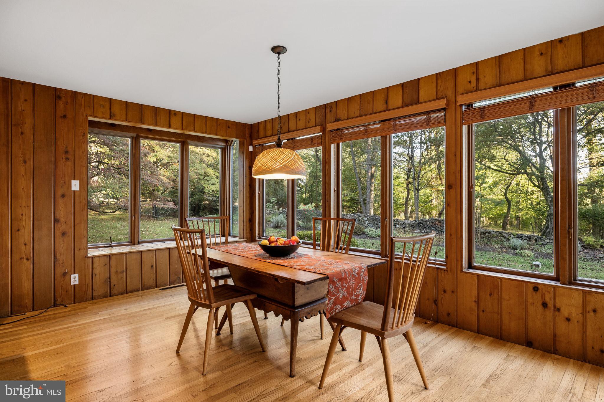 640 Harts Ridge Road Conshohocken, PA 19428 - Photo 13 of 46 a view of a dining room with furniture window and wooden floor