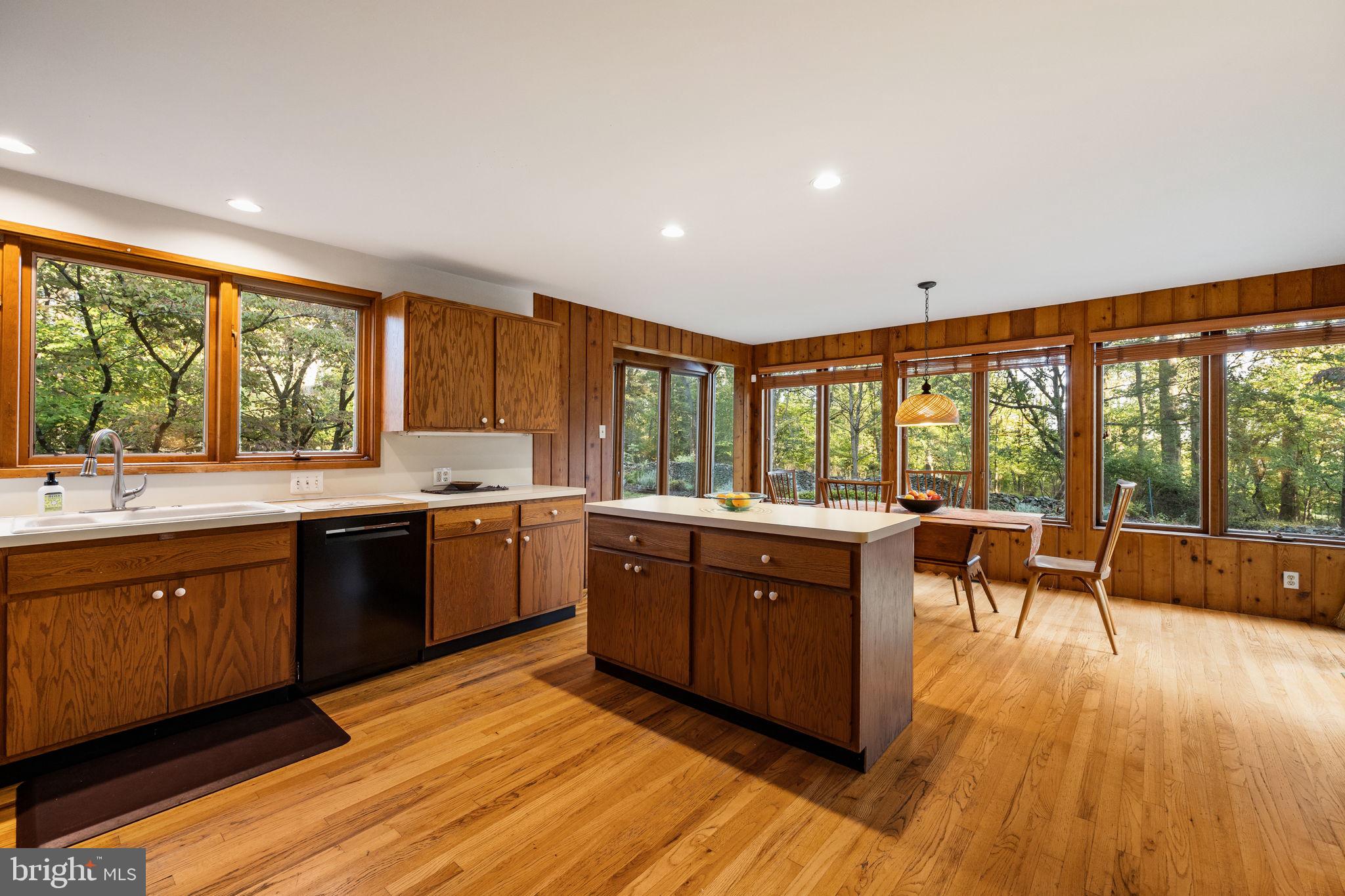 640 Harts Ridge Road Conshohocken, PA 19428 - Photo 14 of 46 a large kitchen with wooden floors and stainless steel appliances