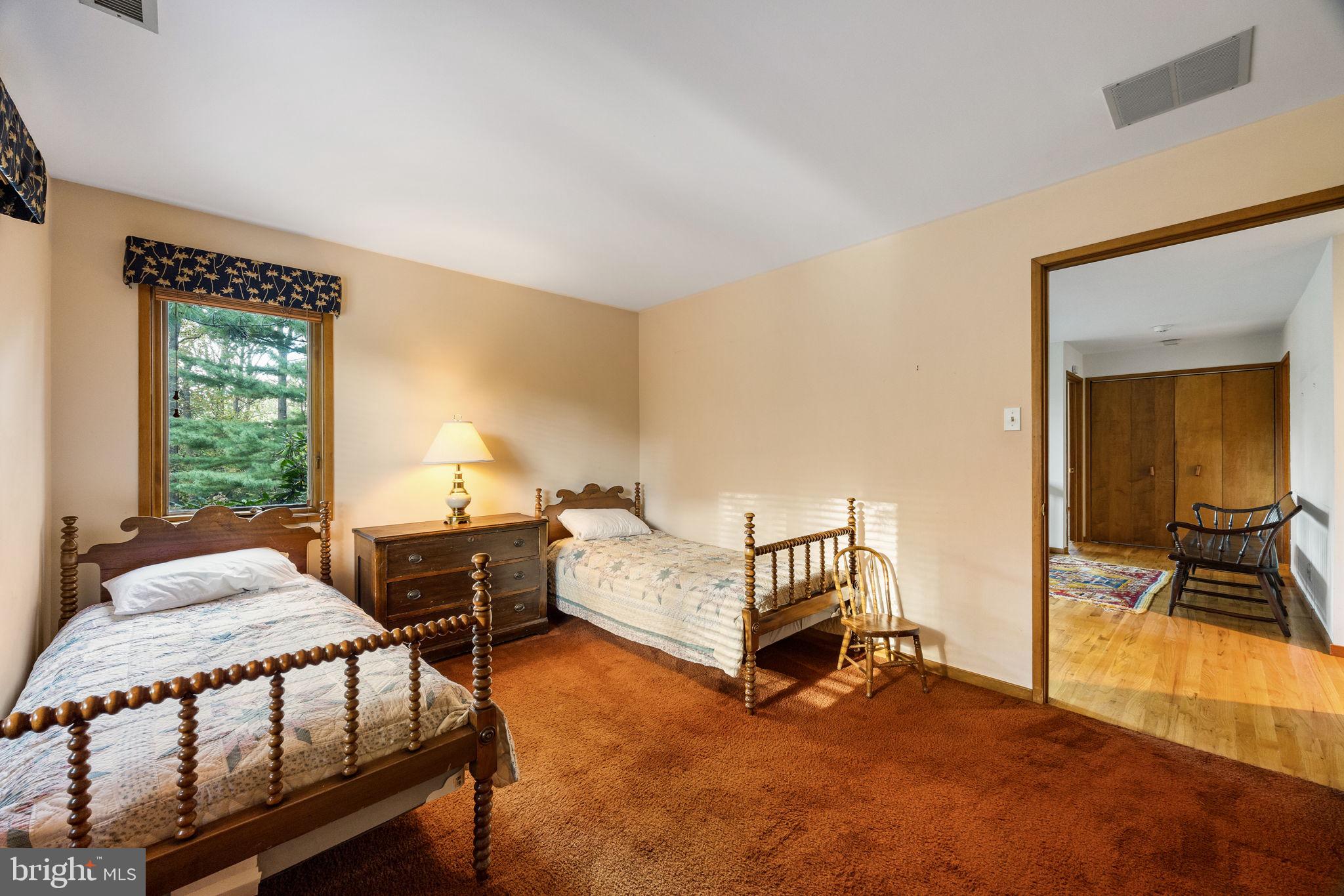 640 Harts Ridge Road Conshohocken, PA 19428 - Photo 32 of 46 a bedroom with furniture and a window
