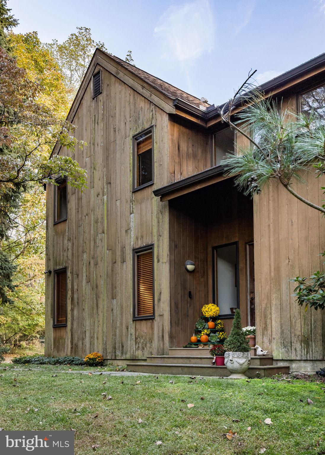 640 Harts Ridge Road Conshohocken, PA 19428 - Photo 4 of 46 a view of a house with backyard and porch