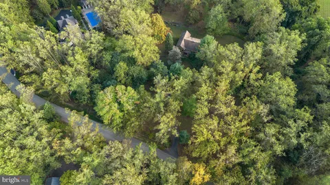 a view of a house with a tree