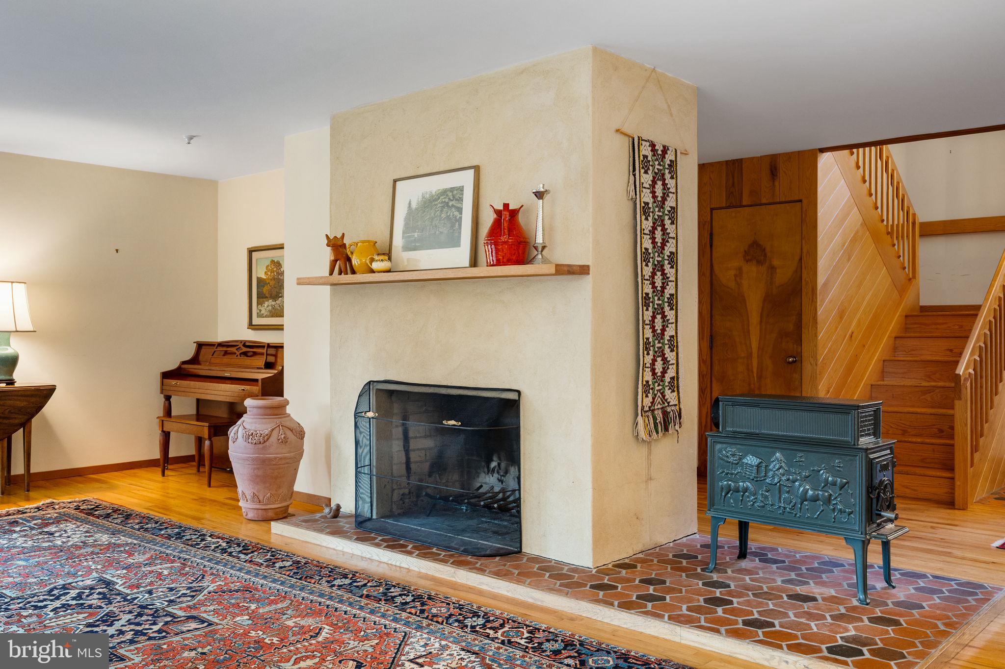 640 Harts Ridge Road Conshohocken, PA 19428 - Photo 10 of 46 a living room with furniture and a fireplace