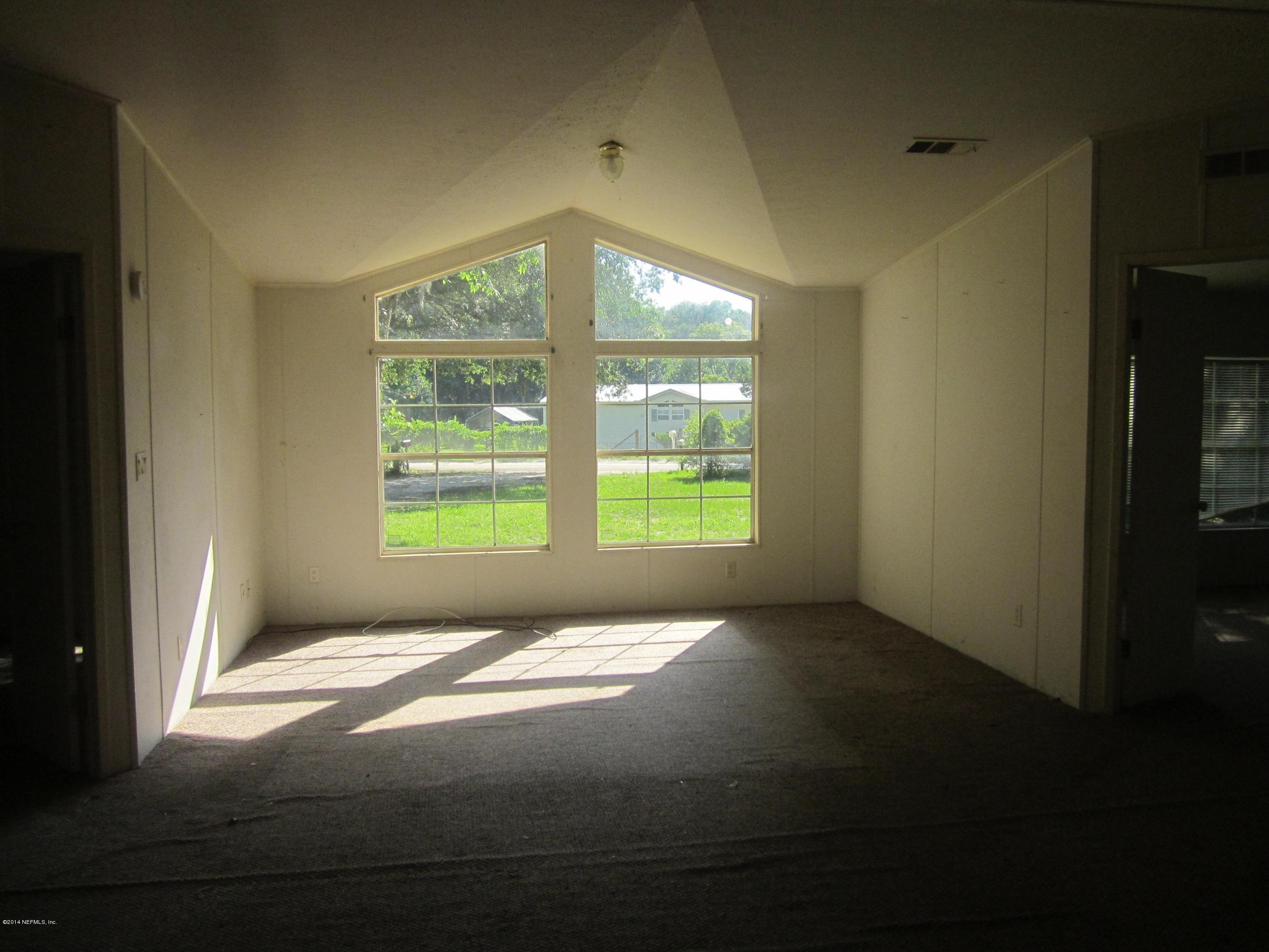 3121 Bainbridge Road, Unit 3 Palatka, FL 32177 - Photo 4 of 12 IMG_0275