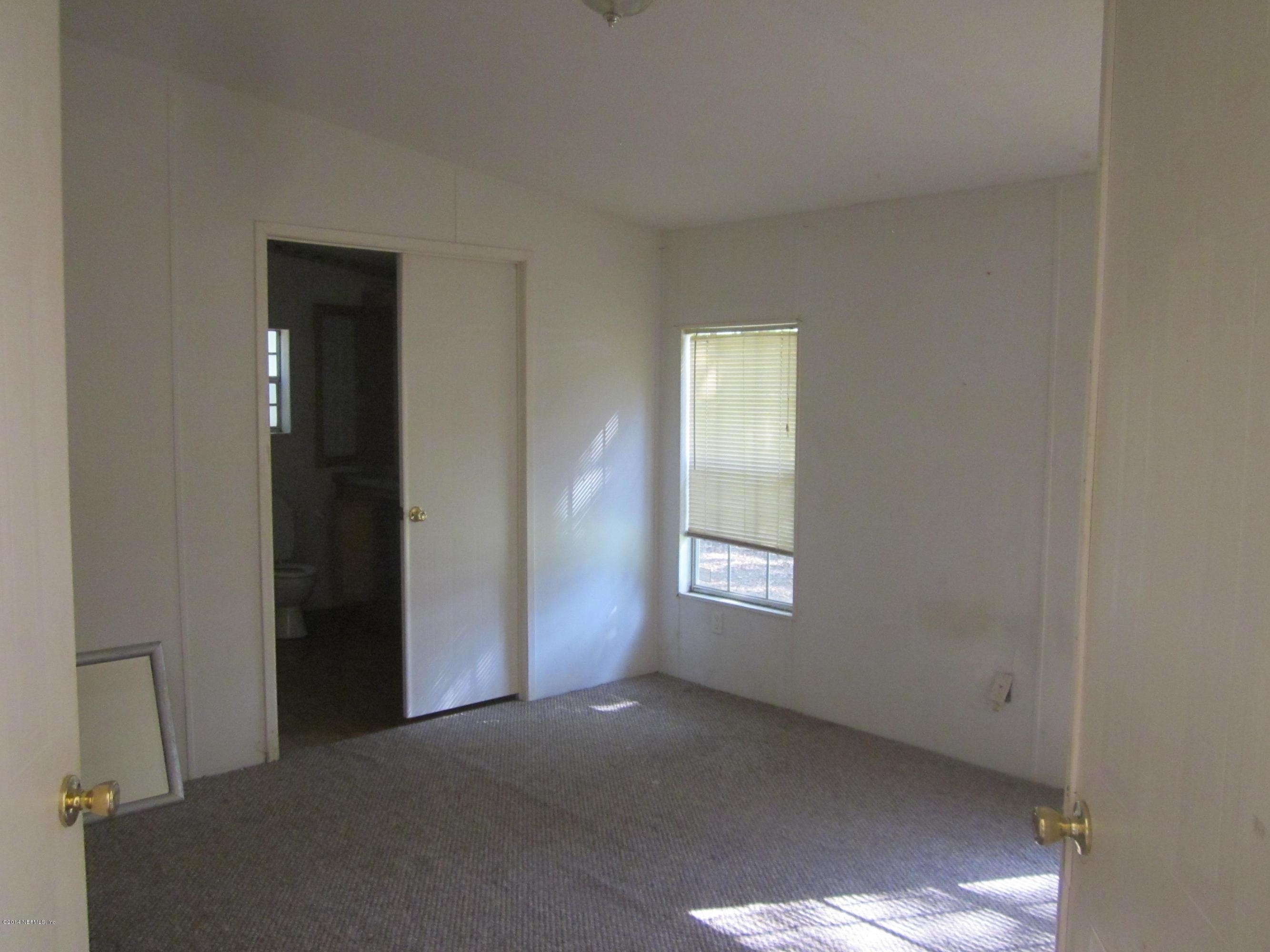 3121 Bainbridge Road, Unit 3 Palatka, FL 32177 - Photo 5 of 12 IMG_0276