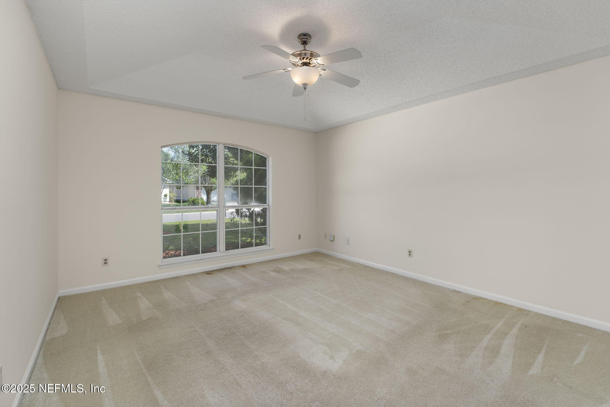 844 MacKenzie Circle St. Augustine, FL 32092 - Photo 18 of 40 a view of an empty room with a window