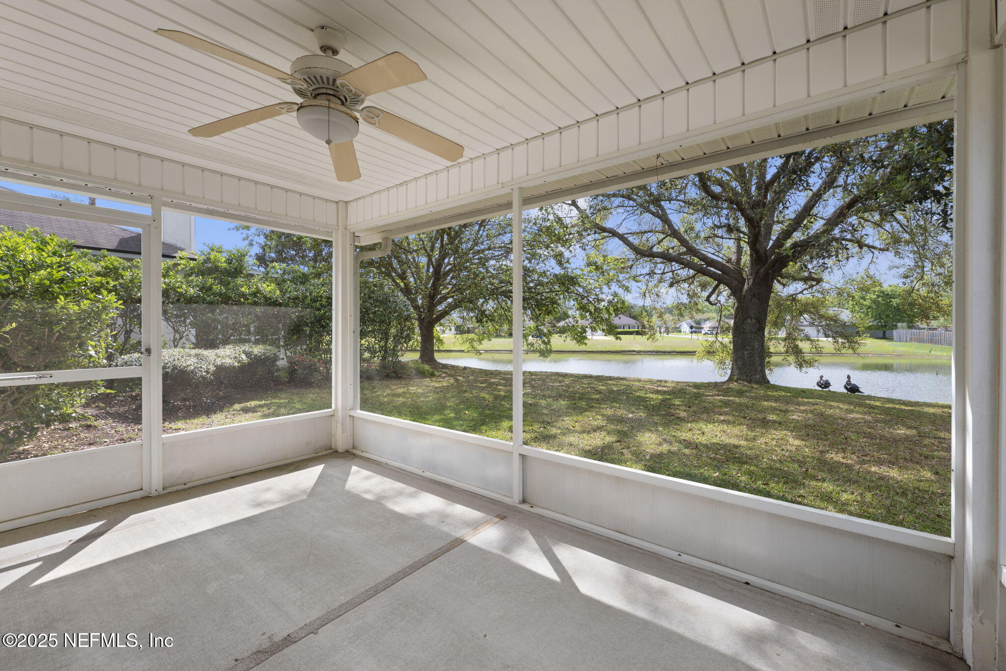 844 MacKenzie Circle St. Augustine, FL 32092 - Photo 29 of 40 a view of a porch with a tv