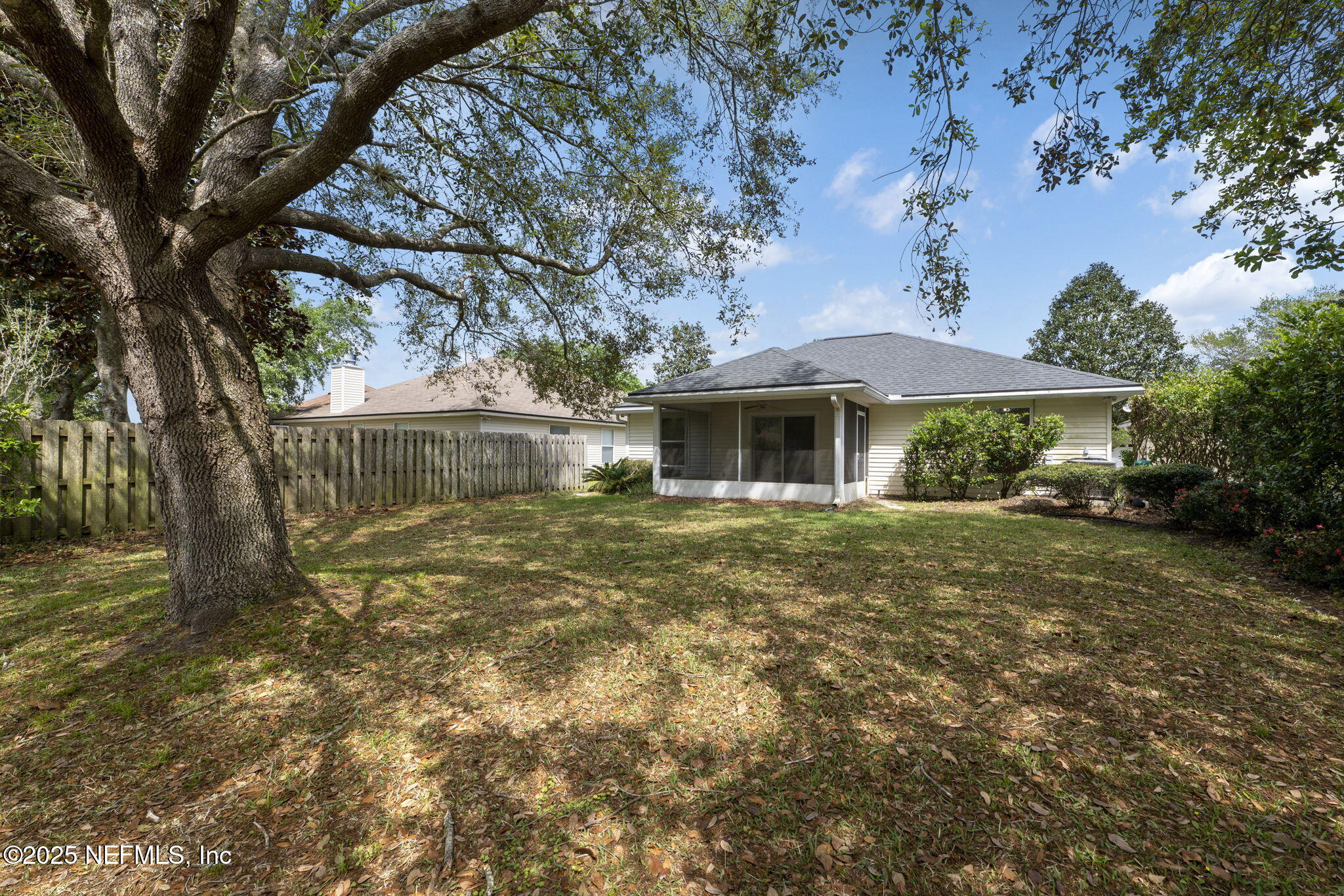 844 MacKenzie Circle St. Augustine, FL 32092 - Photo 32 of 40 a front view of a house with a garden