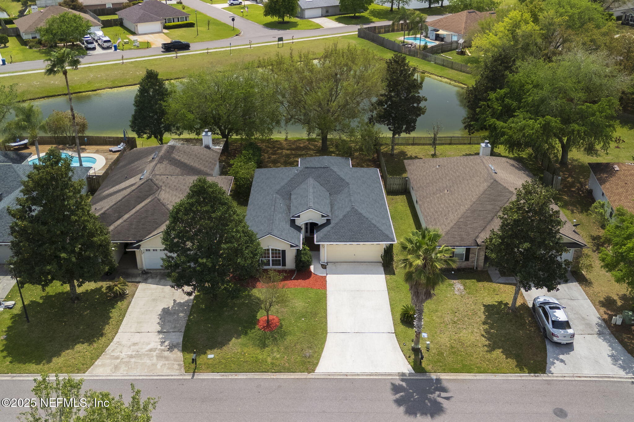 844 MacKenzie Circle St. Augustine, FL 32092 - Photo 35 of 40 an aerial view of a house with yard
