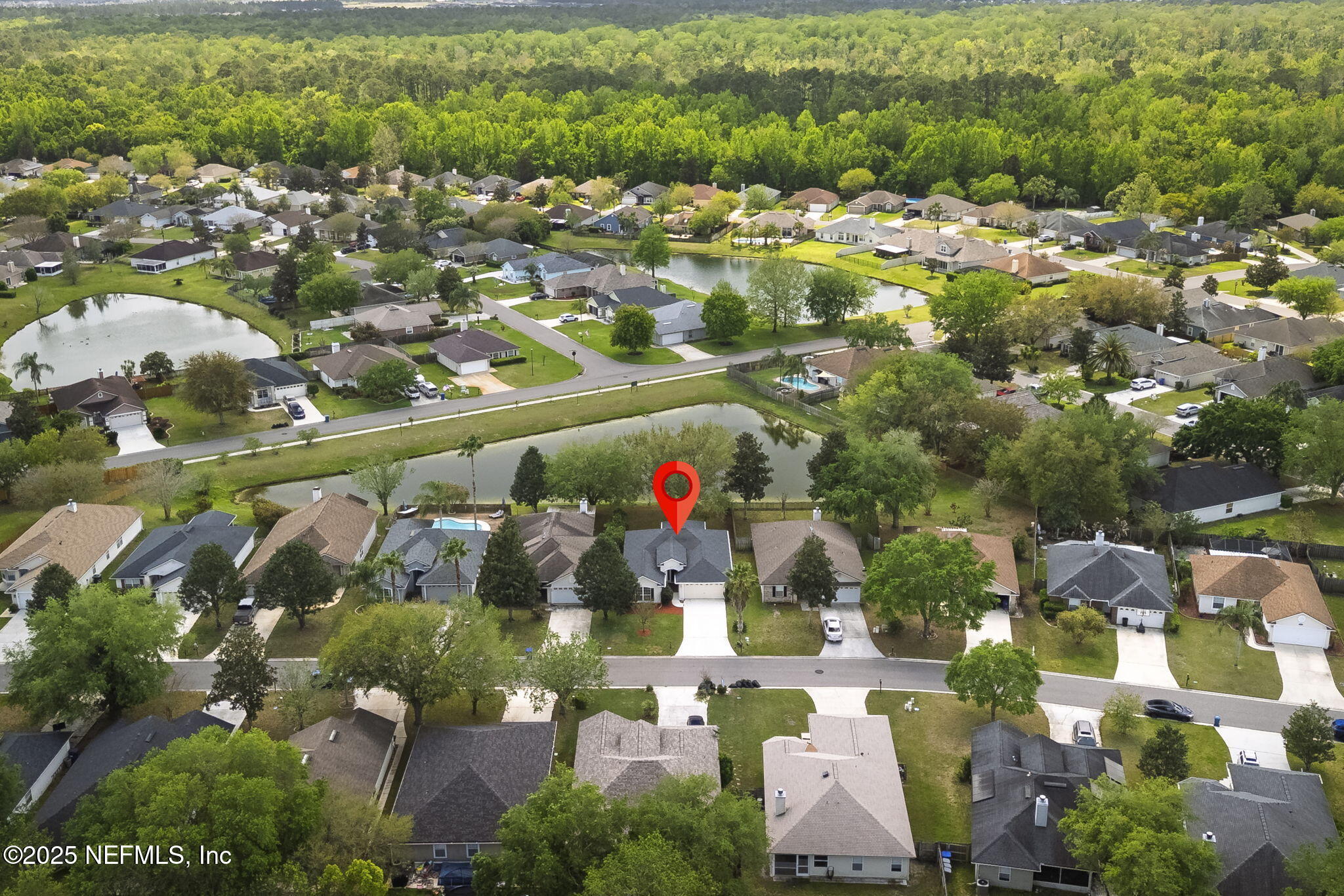 844 MacKenzie Circle St. Augustine, FL 32092 - Photo 37 of 40 an aerial view of residential houses with outdoor space and street view