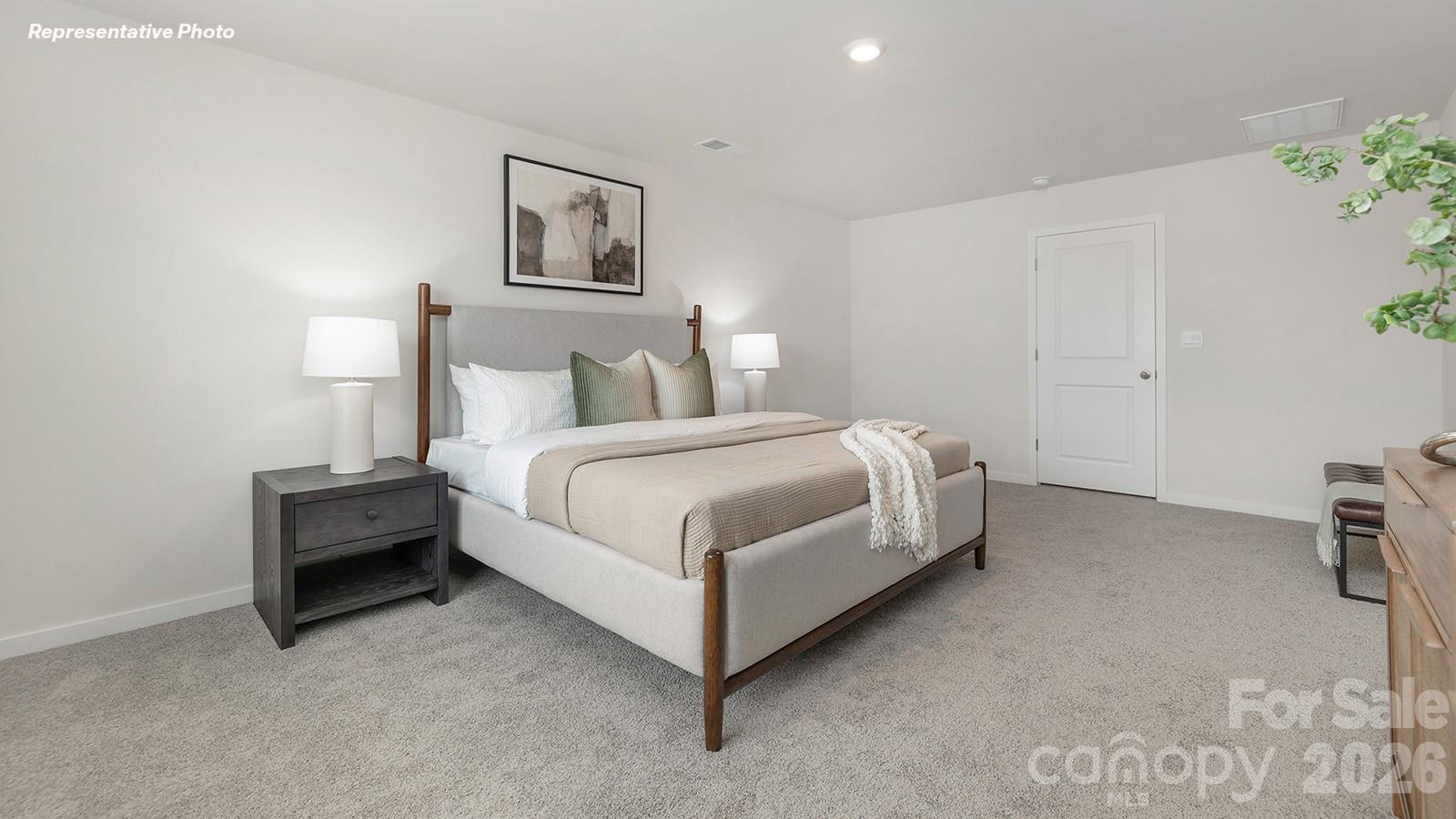239 Superstar Street Salisbury, NC 28147 - Photo 15 of 28 a bed room with a bed and a couch
