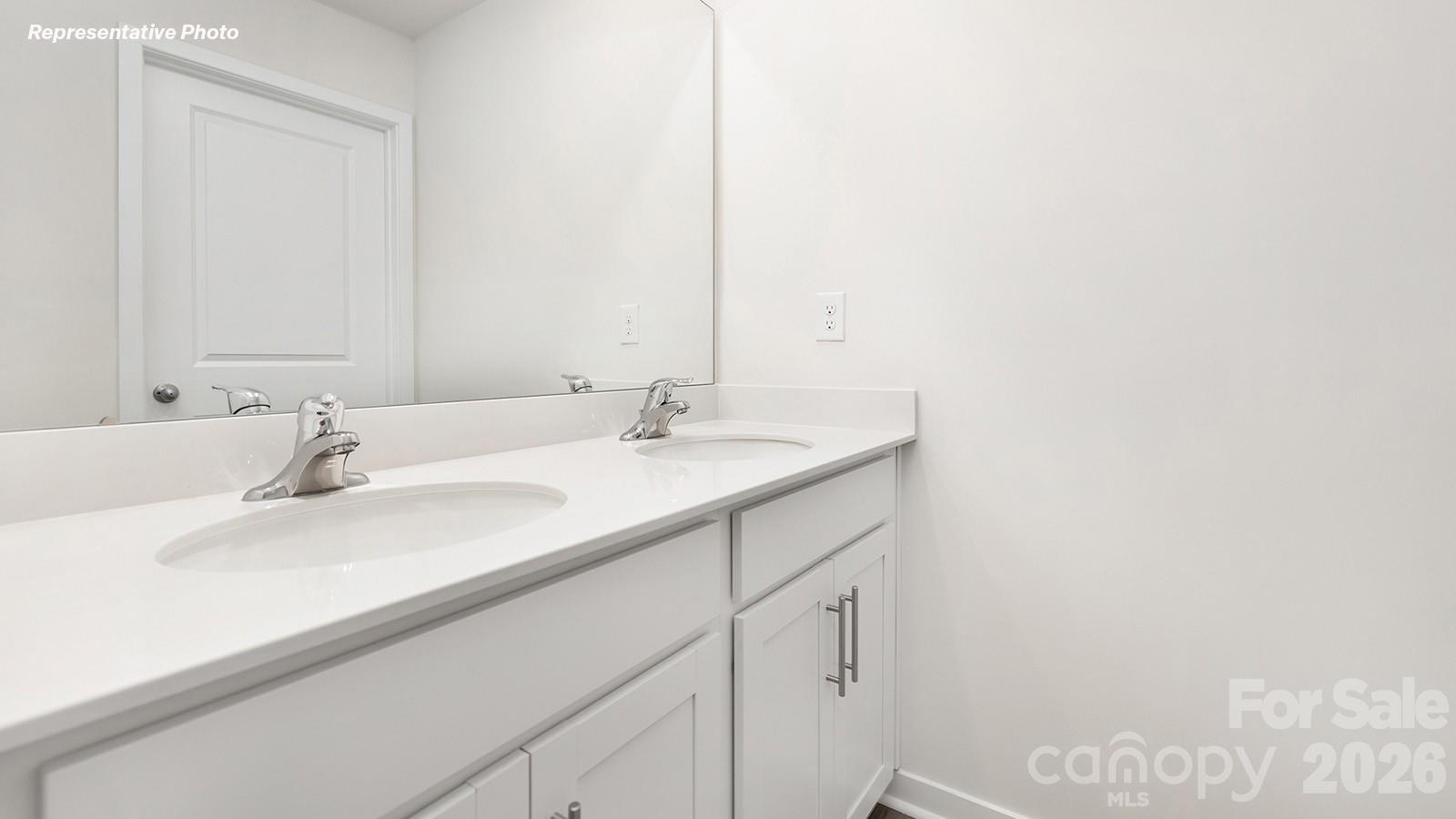 239 Superstar Street Salisbury, NC 28147 - Photo 24 of 28 a bathroom with a sink and a mirror