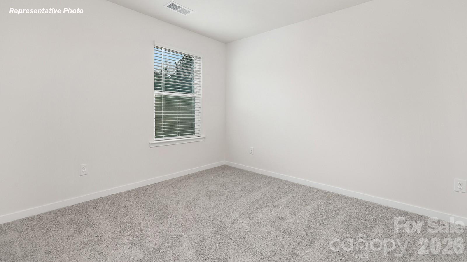 239 Superstar Street Salisbury, NC 28147 - Photo 26 of 28 an empty room with windows