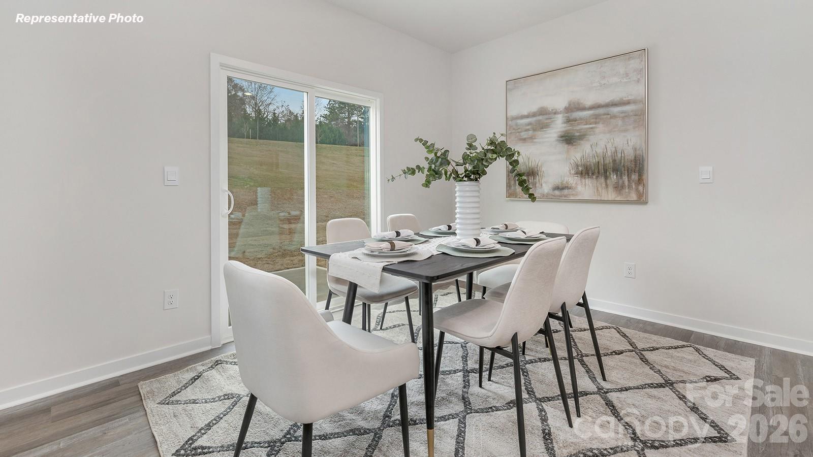 239 Superstar Street Salisbury, NC 28147 - Photo 5 of 28 a view of a dining room with furniture and window