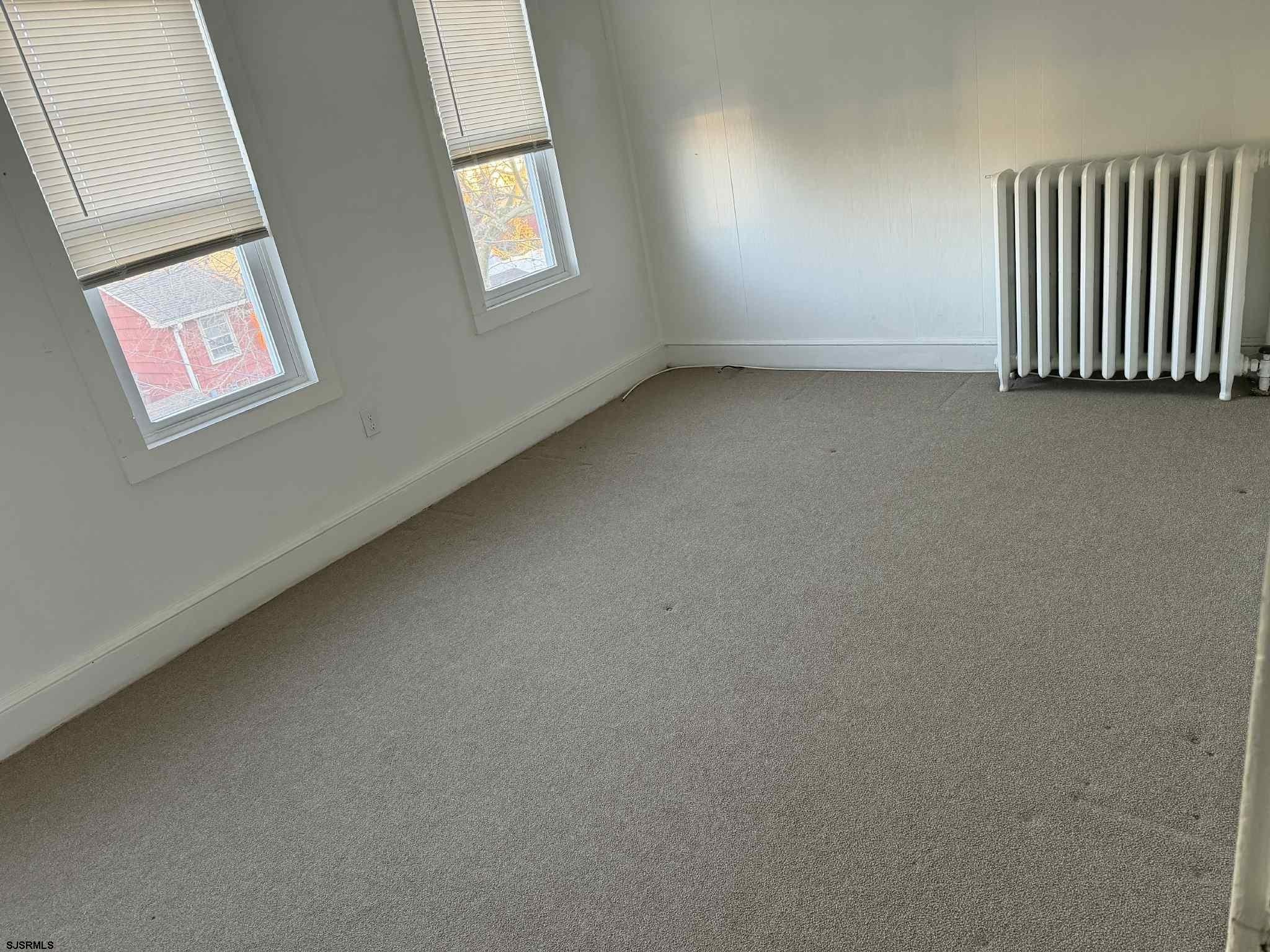 432 Wisteria Road Atlantic City, NJ 08401 - Photo 15 of 22 an empty room with windows