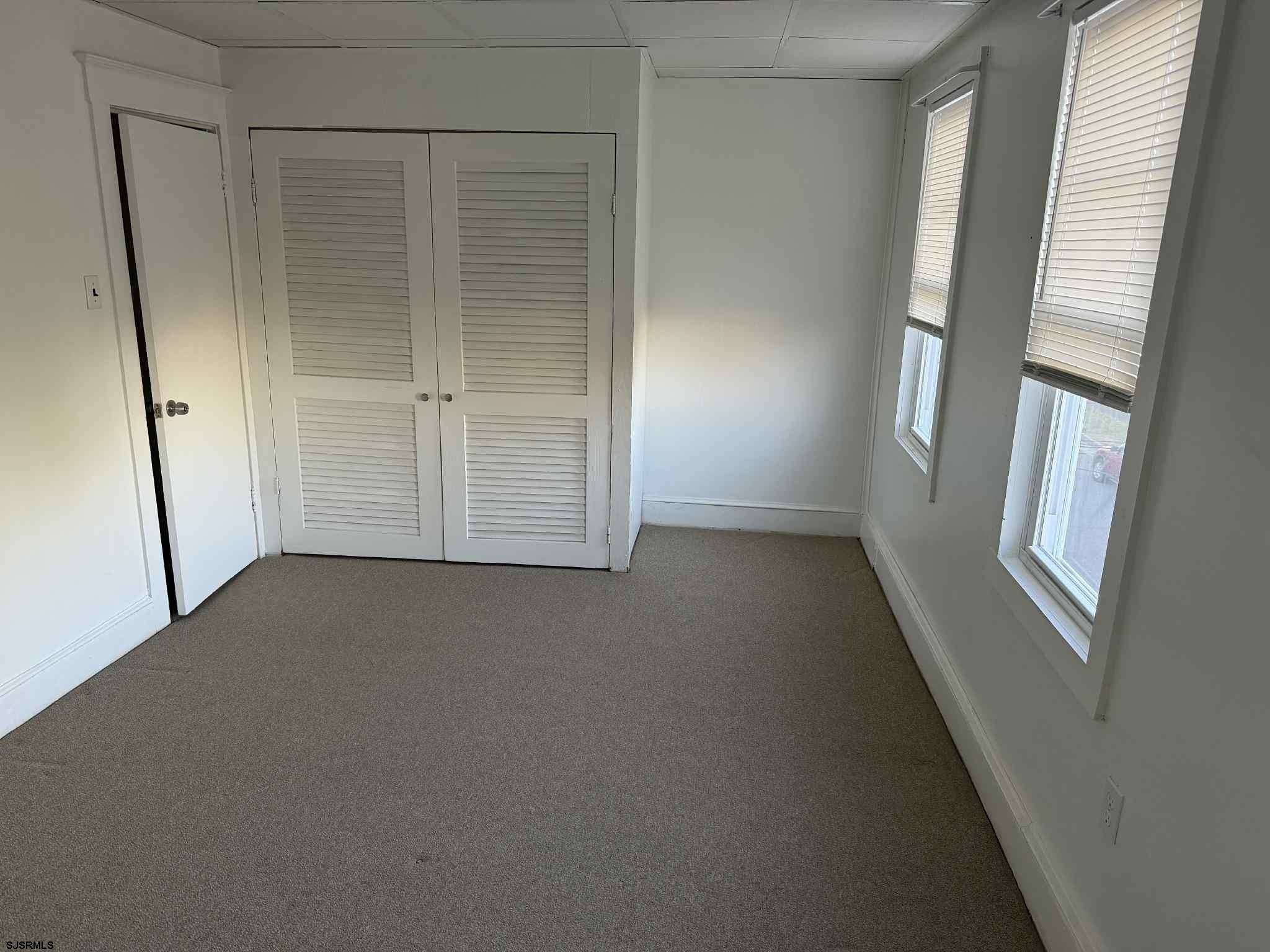 432 Wisteria Road Atlantic City, NJ 08401 - Photo 17 of 22 an empty room with windows