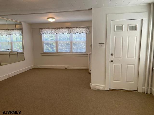 432 Wisteria Road Atlantic City, NJ 08401 - Photo 2 of 22 an empty room with a window