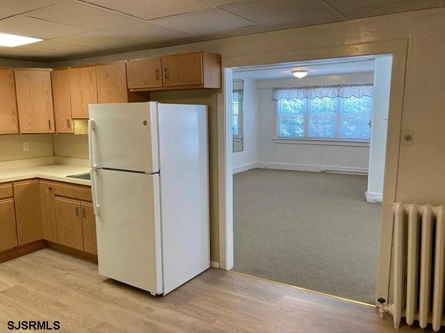 432 Wisteria Road Atlantic City, NJ 08401 - Photo 9 of 22 a white refrigerator freezer and a stove sitting inside of a kitchen