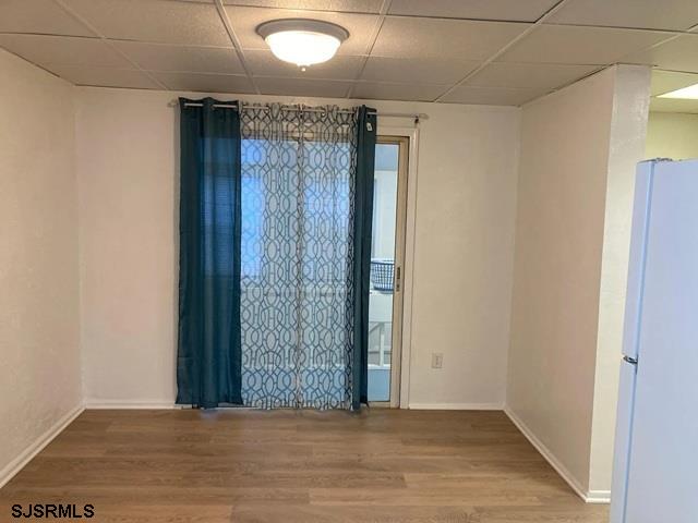 432 Wisteria Road Atlantic City, NJ 08401 - Photo 10 of 22 a view of a hallway with wooden floor and a window