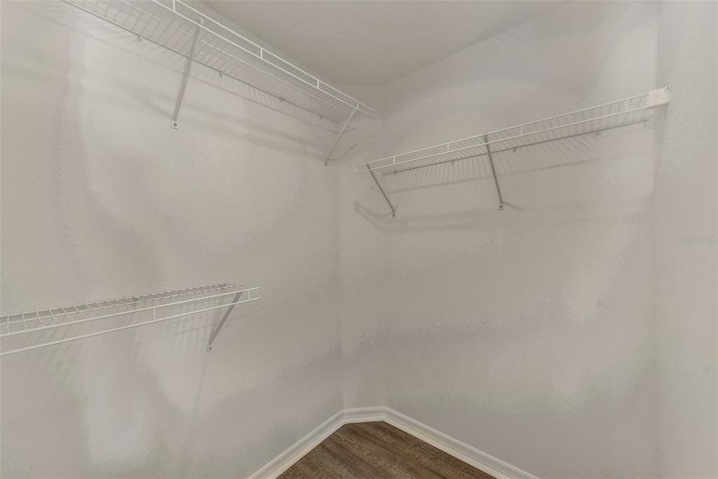 960 Starkey Road, Unit 3302 Largo, FL 33771 - Photo 15 of 28 a view of a room with racks on the wall