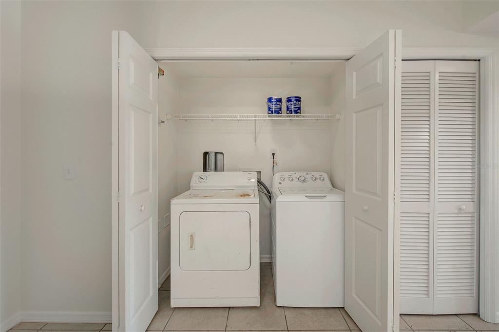 960 Starkey Road, Unit 3302 Largo, FL 33771 - Photo 19 of 28 a utility room with dryer and washer